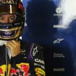 Red Bull-föraren och en mekaniker i en verkstad (AI text)