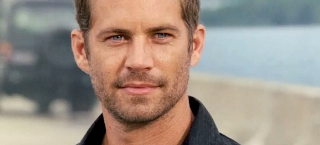 En man i en jacka och en bil. (AI text)