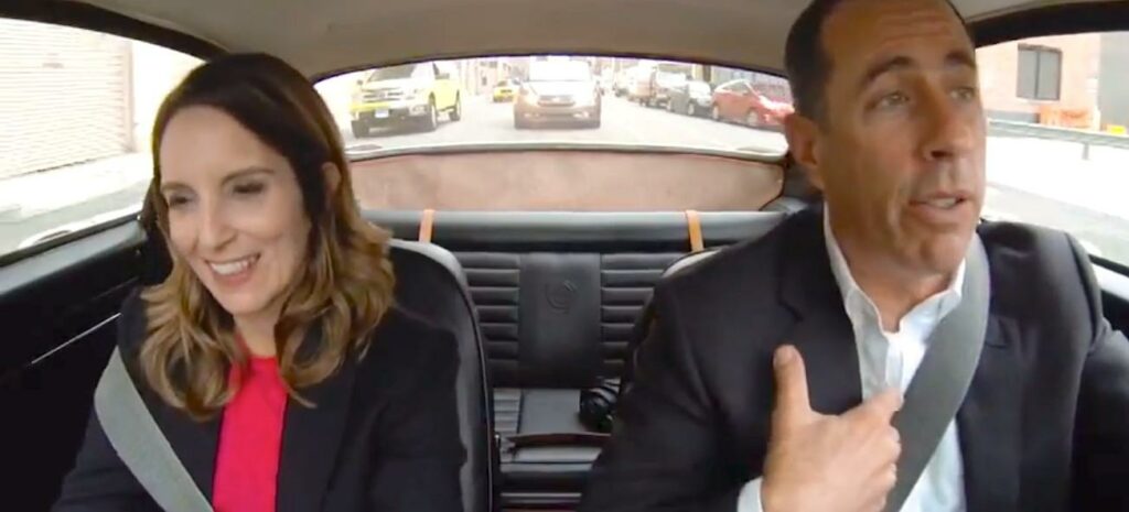 En man och kvinna i en bil. (AI text)