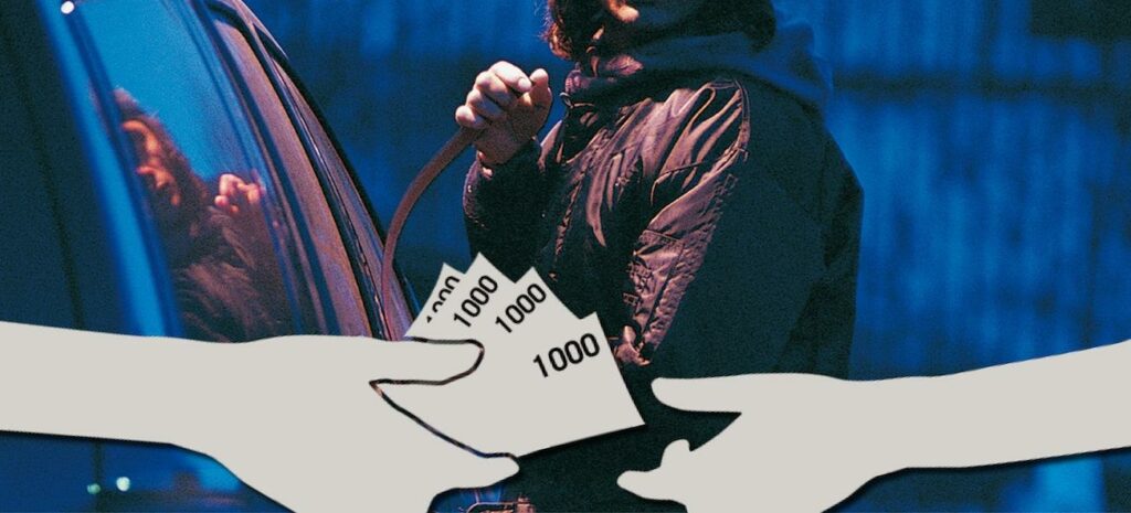 En man räcker över en kort till en annan man. (AI text)