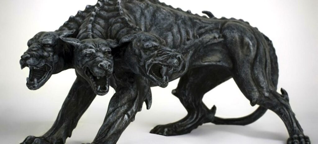 en skulptur av en varg och en lejon (AI text)