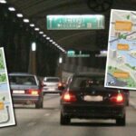 En bil kör genom en tunnel. (AI text)