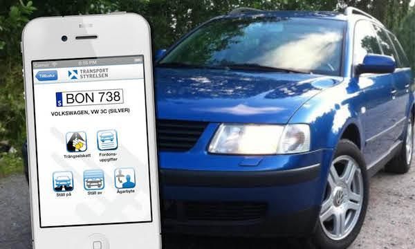 En blå bil med en smartphone-app (AI text)