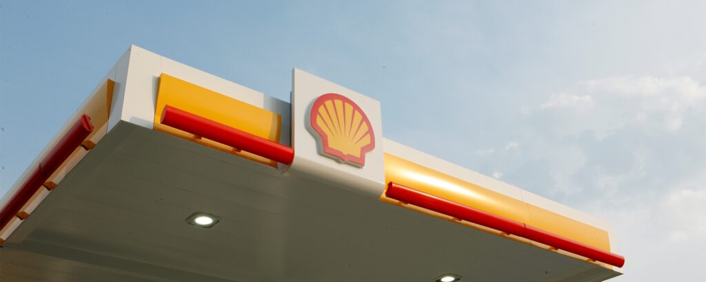 En bensinstation med en skylt (AI text)