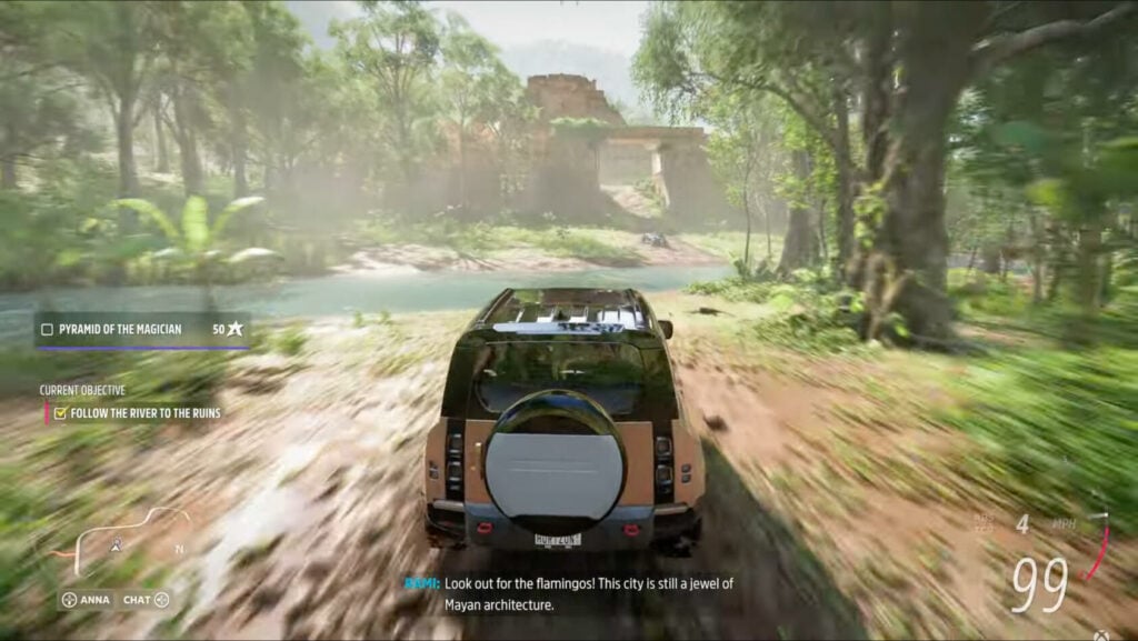 En bil körer längs en väg i en skog. (AI text)