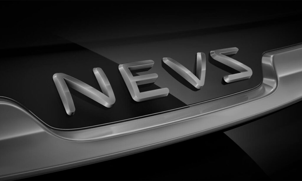 En bil med ordet "nyheter" på räcket. (AI text)