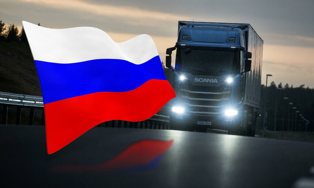 En lastbil med en rysk flagga på vägen. (AI text)