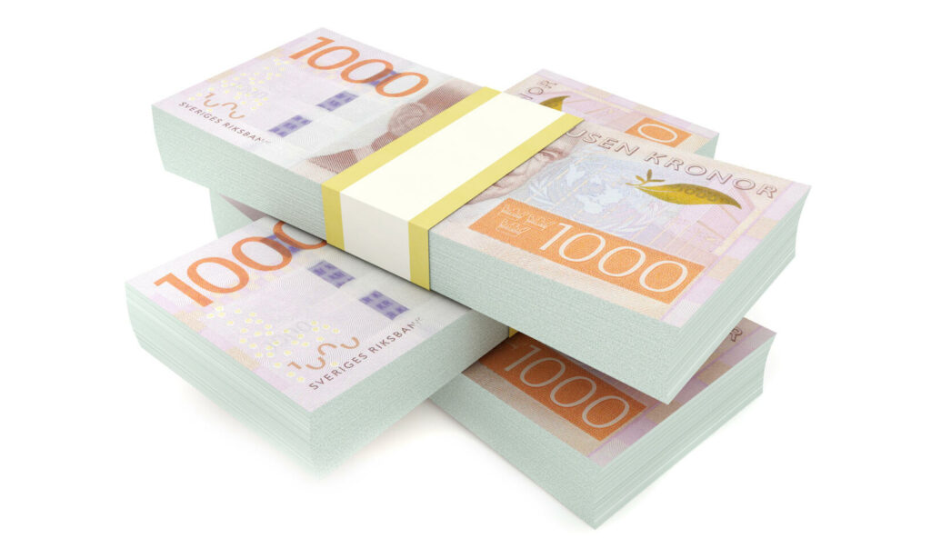 En stapel sedlar isolerade på vit bakgrund. (AI text)