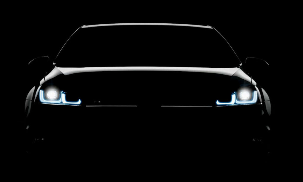 En bil i mörkret med däcken på. (AI text)