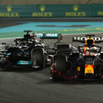 Personer tävlar i F1-Grand Prix under Qatar Grand Prix. (AI text)