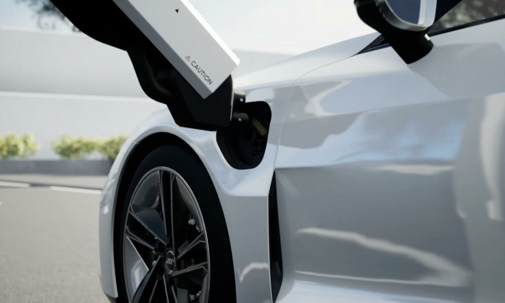 En vit bil är uppkopplad till en elladdare. (AI text)