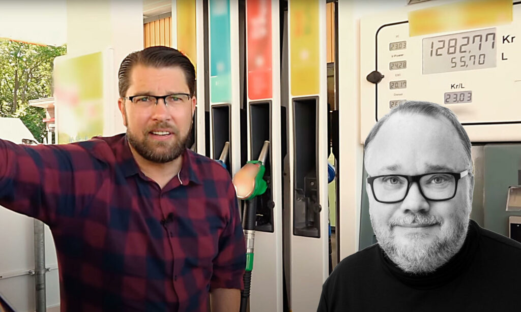 Två män står framför en bensinstation. (AI text)