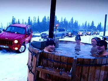 En varmvattensbad i snön (AI text)