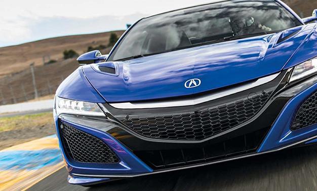 Acura NSX körs på en bana. (AI text)