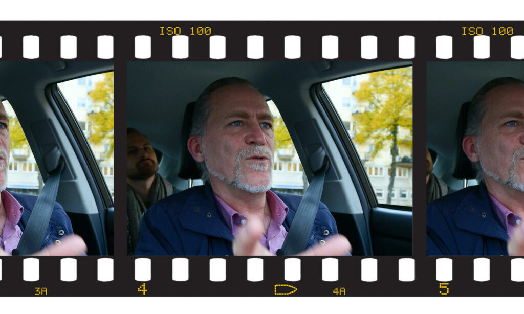 En man i en bil (AI text)