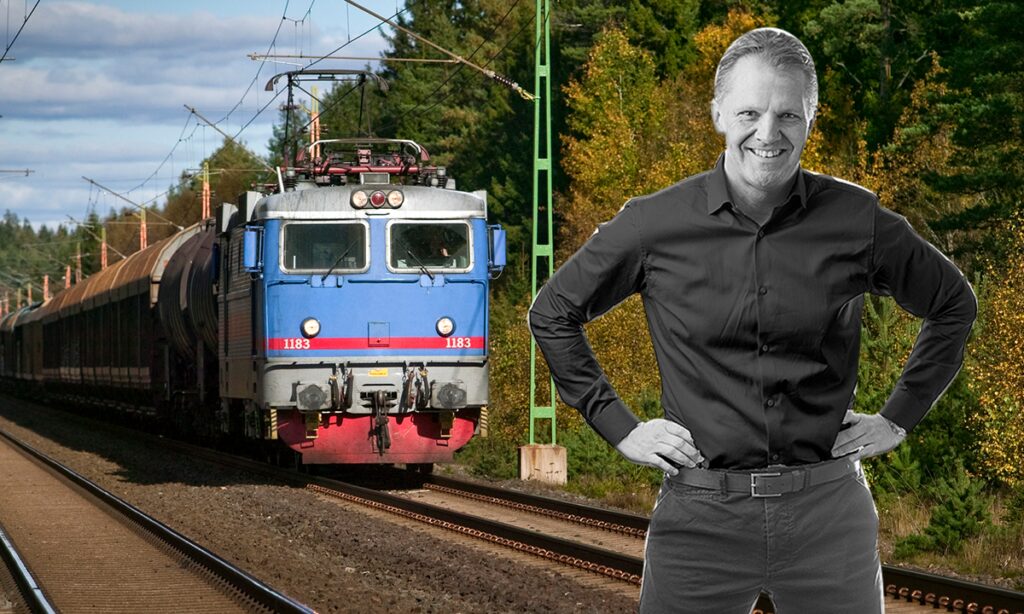 En man står på järnvägs spår. (AI text)