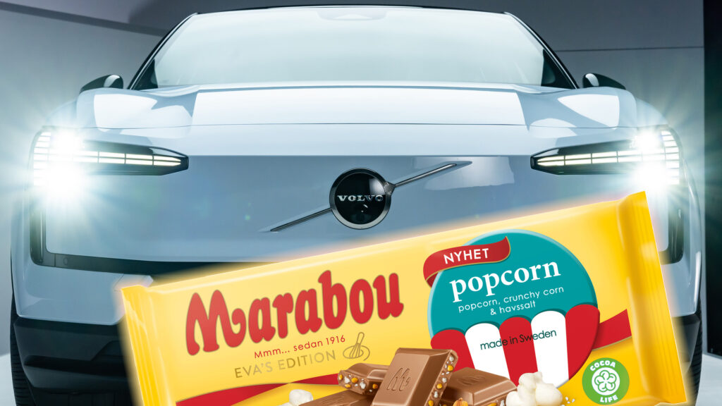 En bil med en chokladbar framför den (AI text)