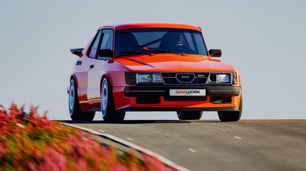 En röd bil kör nedför en backe. (AI text)