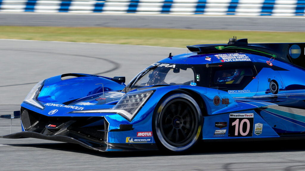 En racebil kör på en bana. (AI text)