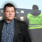 En man i väst står framför ett byggnad. (AI text)