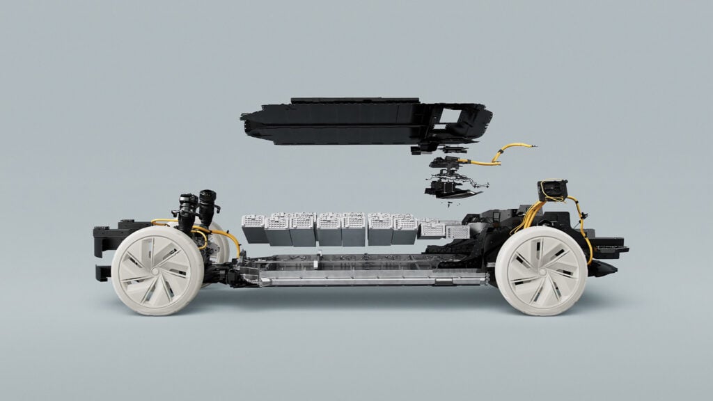 En Lego-bil med ett Lego-motiv på en grå bakgrund, 3D-rendering, vektorillustration. (AI text)