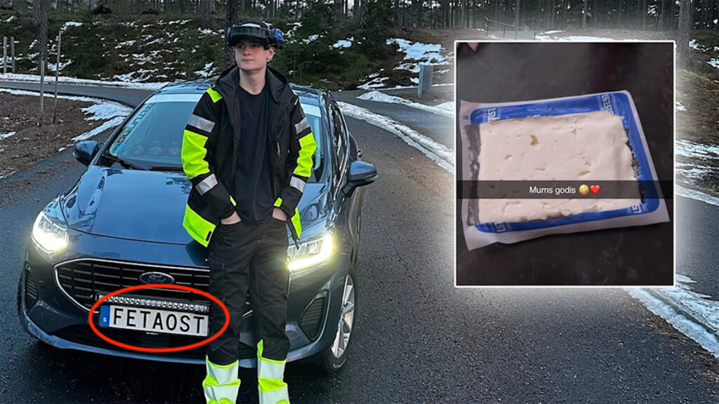 En man i gult västar står bredvid en bil med en plåt på den. (AI text)