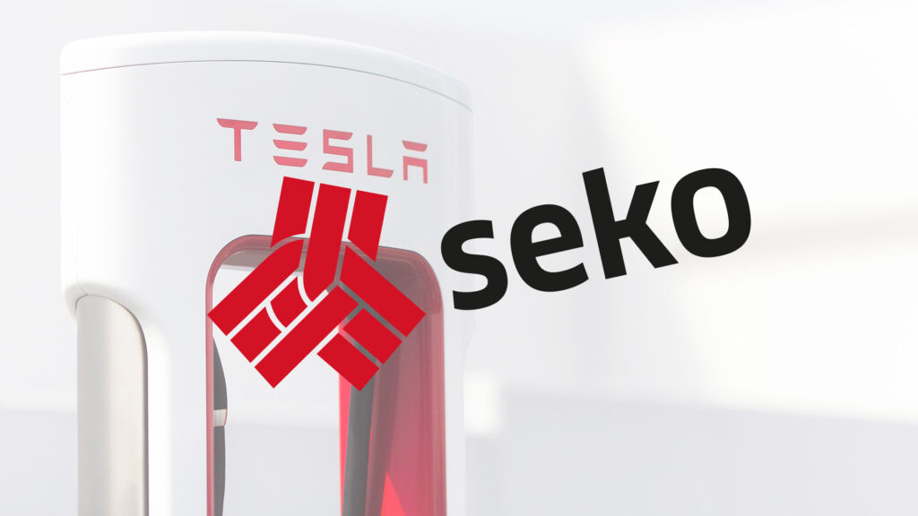 Tesla S-eko laddstation i ett vitt rum (AI text)