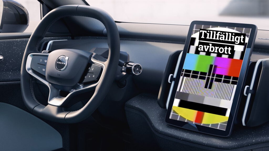 En bil med en surfplatta i instrumentbrädet. (AI text)