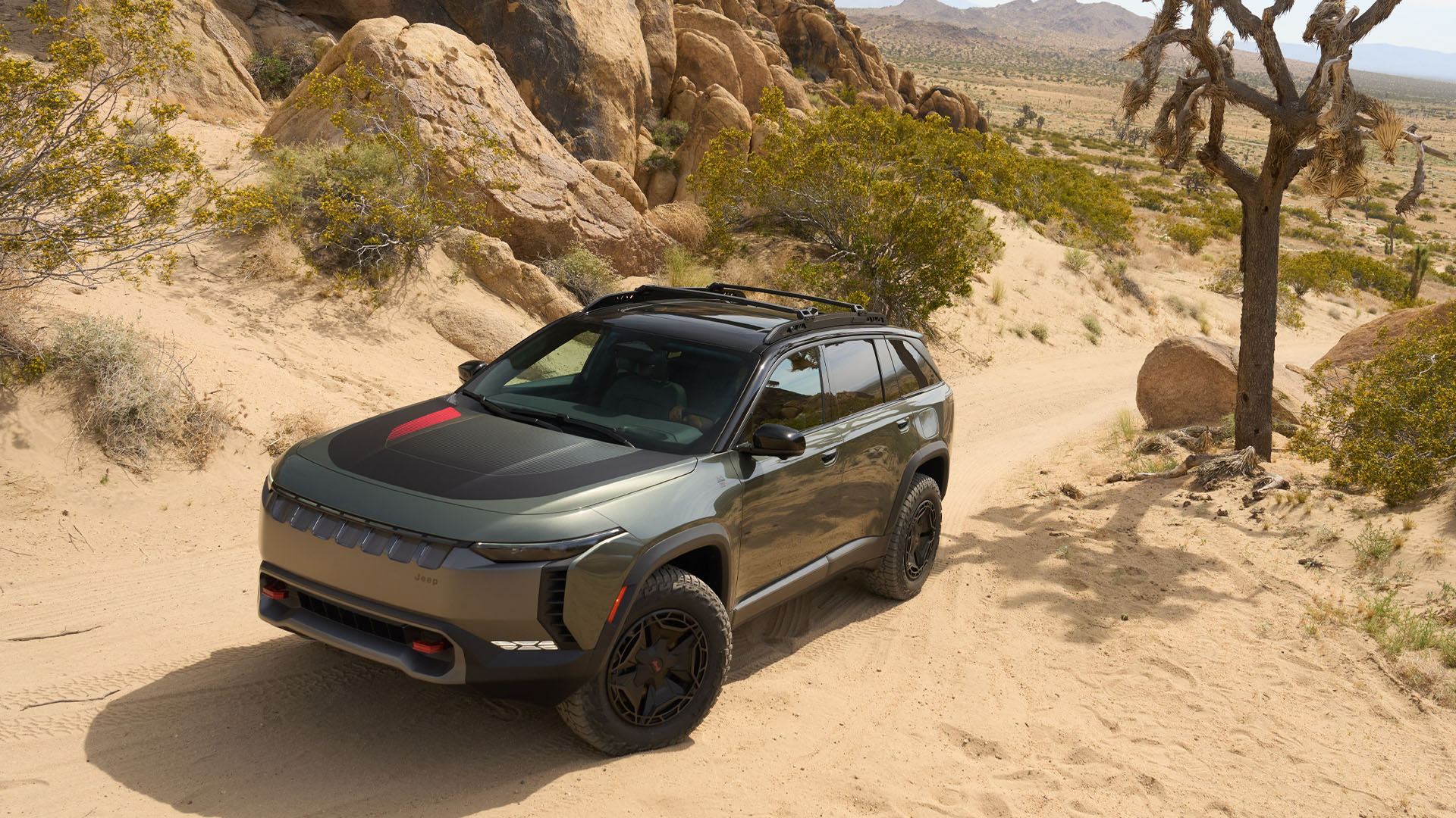 en SUV som kör längs en ökenväg (AI text)