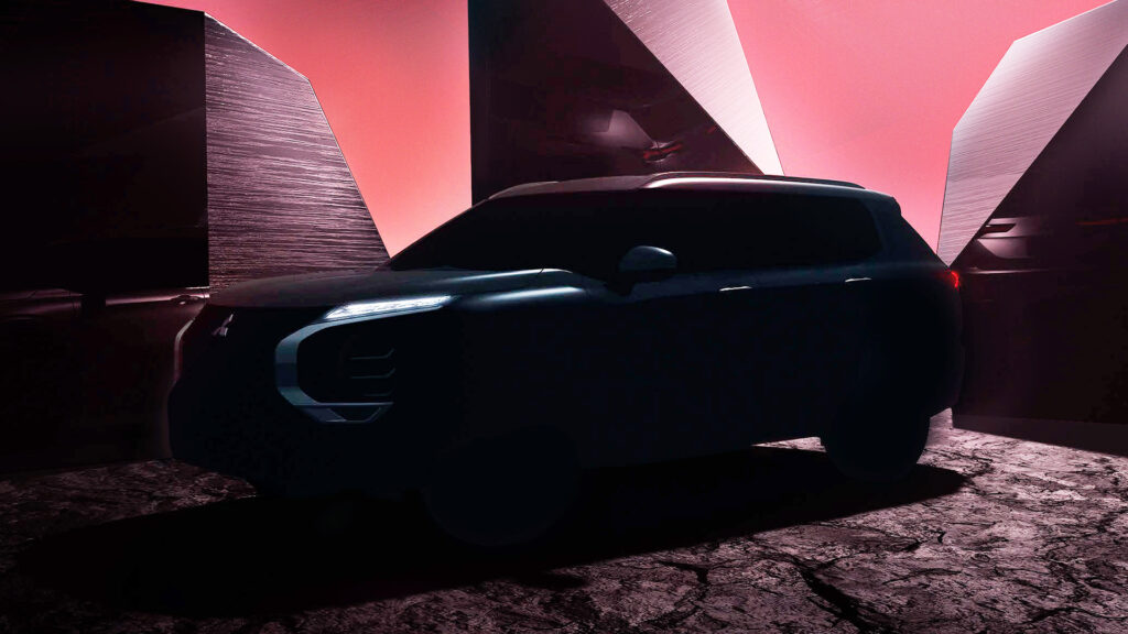 En SUV i en mörk rum med en ljus på den. (AI text)