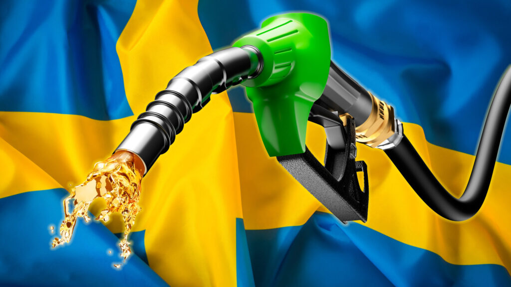 Bansintankpistol med svensk flagga i bakgrunden