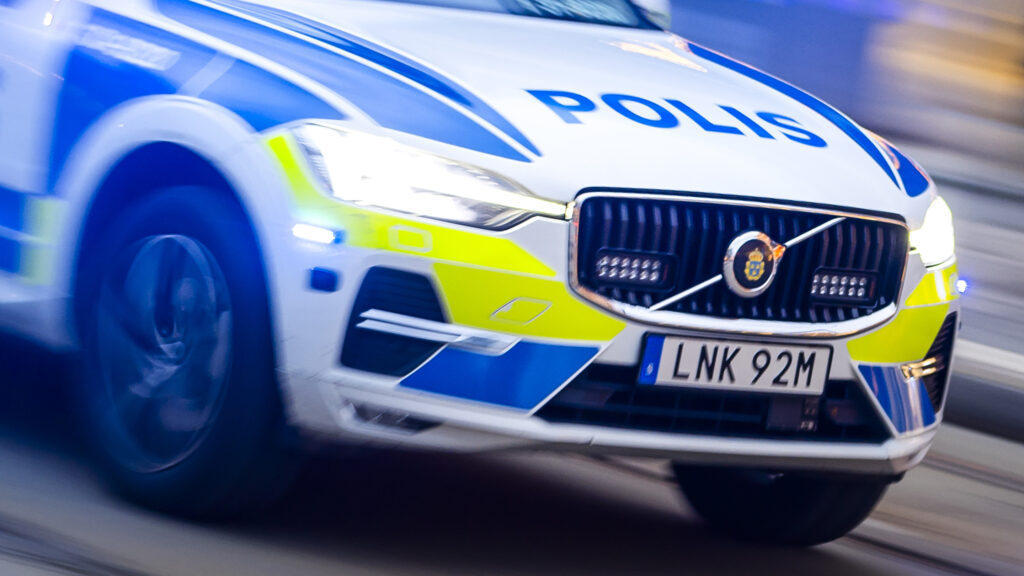 Polisbil under uttryckning