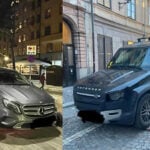 Beslagtagna bilar som bärgas bort.