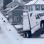 Vit Volvo-lastbil lättar efter ett gupp