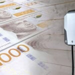 Laddbox i emmagarage och massor av tusenlappar