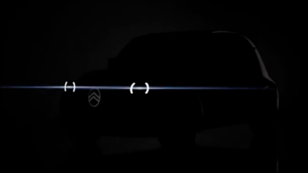 Teaserbilden skvallrar om siluetten för nya eldrivna Citroën 2CV, med de klassiska runda formerna och moderna LED-strålkastare. Foto: Citroën