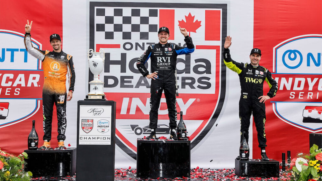 Prispallen i Indycar i Markham med Romain Grosjean till vänster, Marcus Ericsson i mitten och Will Power till höger. 