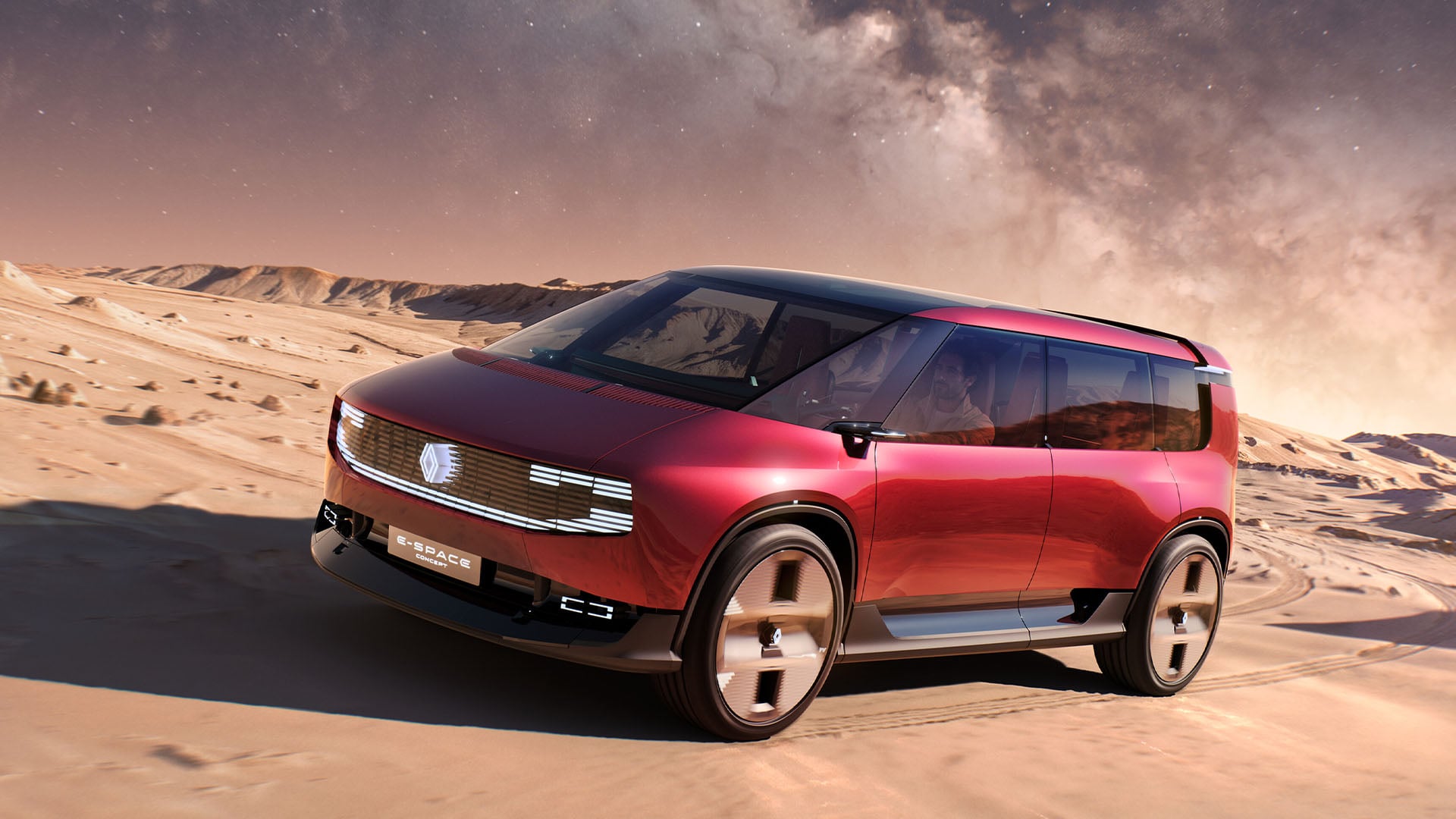 Rödmetallic Renault E-Space concept snett från sidan.