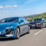 Tre bilar på väg: Audi, BMW och Volvo